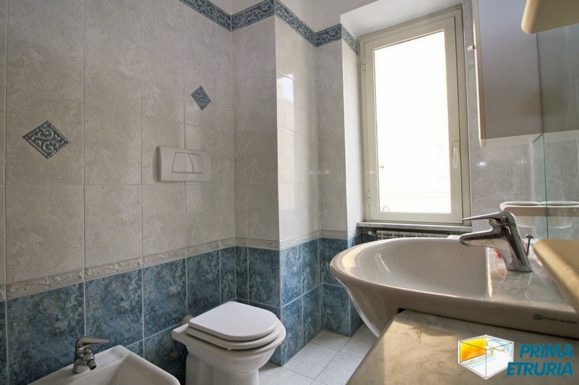 - GROSSETO - AMPIO TRILOCALE CON POSTO AUTO