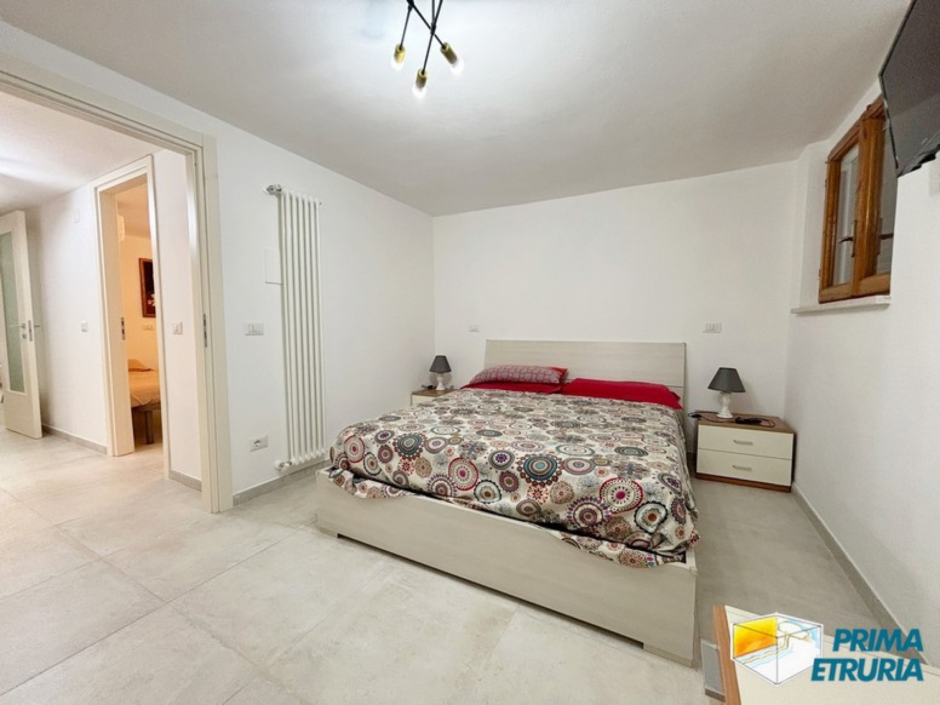 Trilocale rinnovato con giardino privato immerso nella pineta - ZONA CENTRO -
